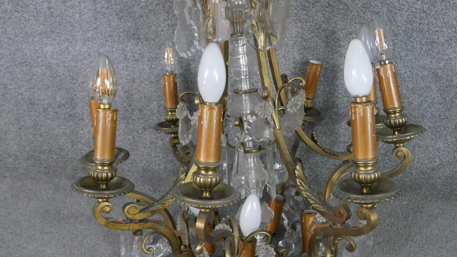 A scrolling gilt brass and crystal eight branch chandelier with hanging crystal drops and foliate - Image 2 of 11