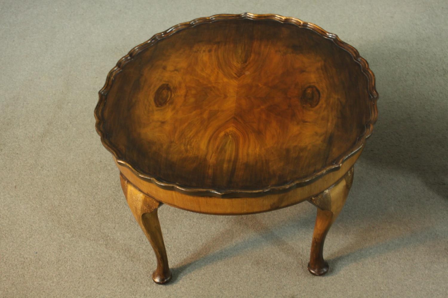 A 1930's figured walnut coffee table, with a circular pie crust top on cabriole legs, together - Image 7 of 7