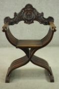 A 19th century Italian walnut Savonarola chair, of slatted form and folding construction, the back