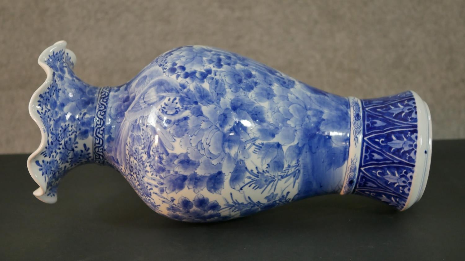 A large Japanese early 20th century blue and white hand painted porcelain vase with fluted edge. - Image 10 of 12