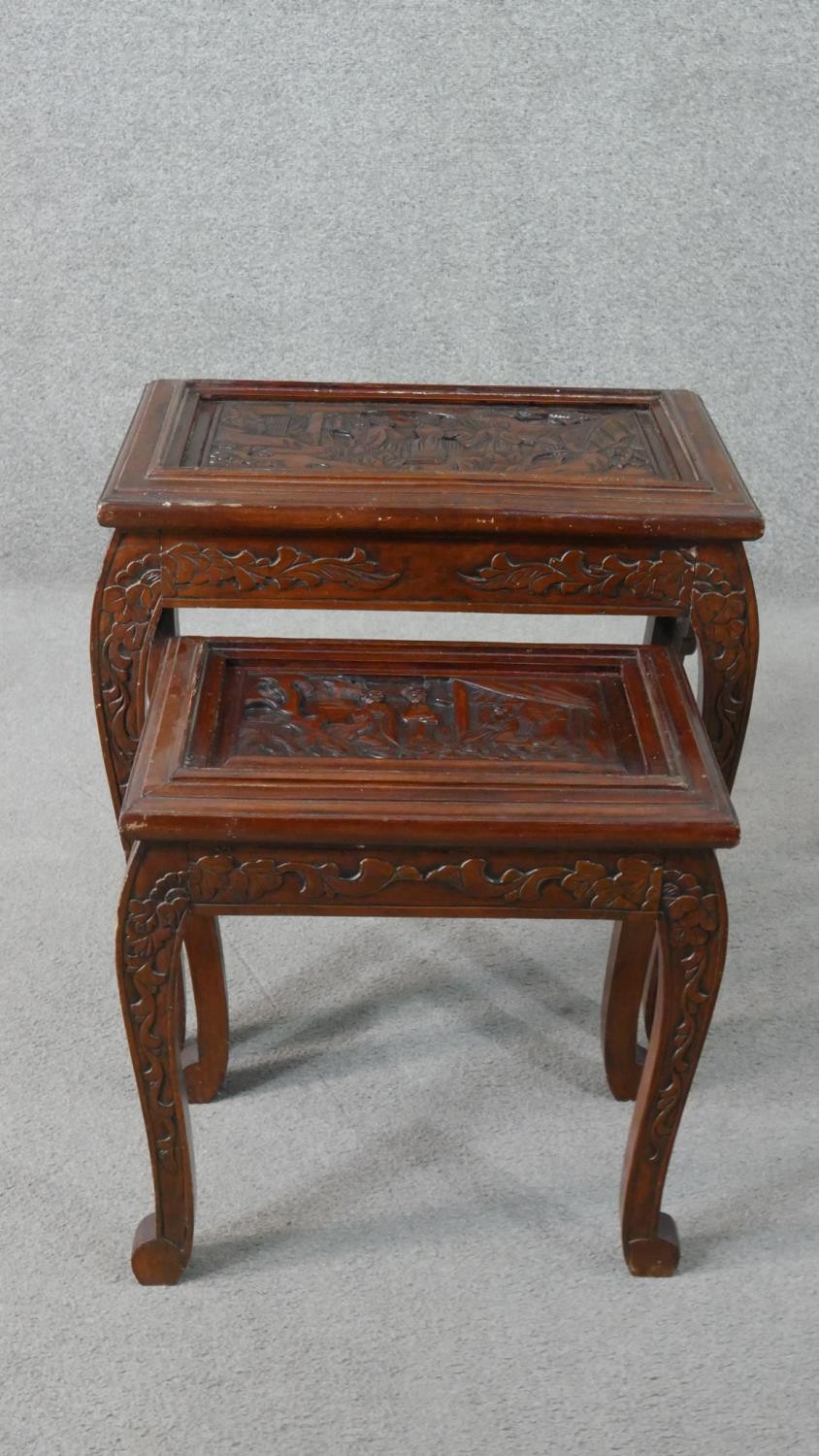 A nest to two Chinese hardwood occasional tables, with carved figural scenes to the top, on - Image 3 of 10