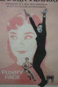 A framed and glazed original Funny Face (1957) US one sheet film poster, starring Audrey Hepburn and