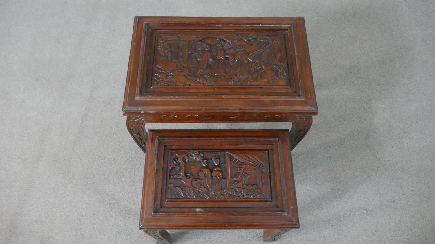 A nest to two Chinese hardwood occasional tables, with carved figural scenes to the top, on - Image 5 of 10