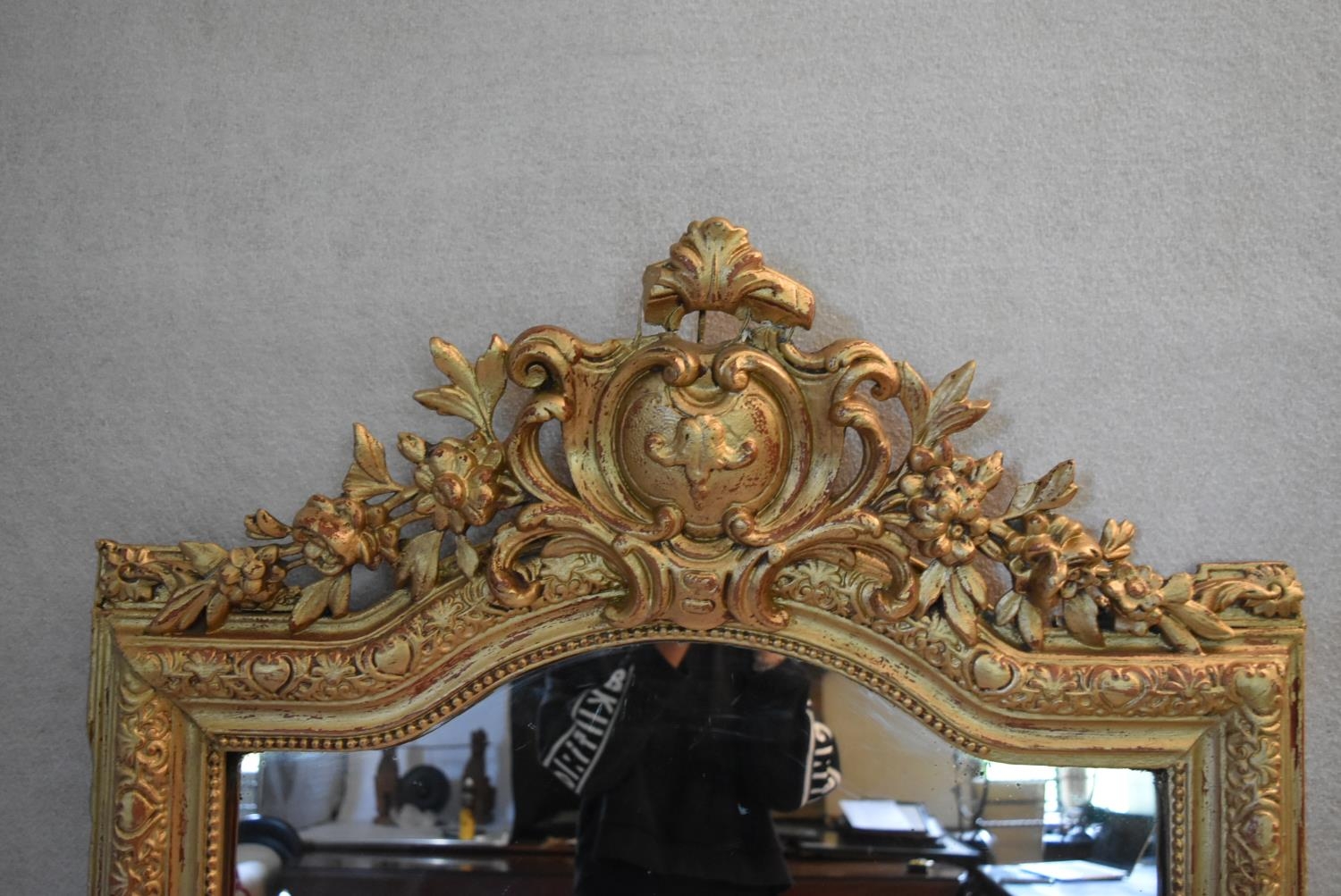 A 19th century overmantel or pier mirror in a gold painted foliate gesso frame. H.153 W.92cm - Image 4 of 6