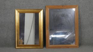 A gilt framed rectangular mirror, together with a pine framed mirror. H.81 W.61cm (largest)