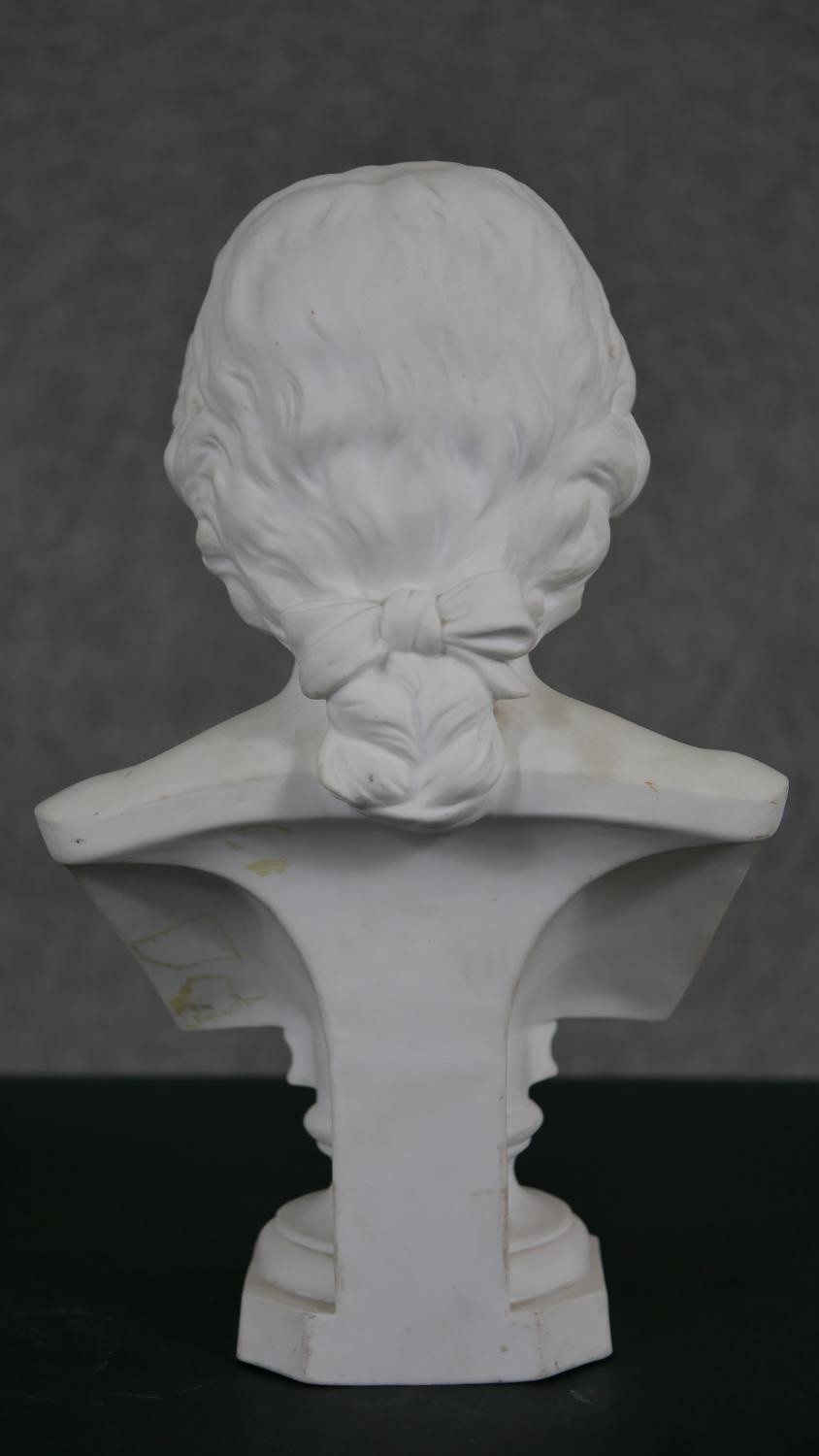 A Parian ware bust of Mozart, the bust inscribed below and on plinth base. H.30 W.18 D.10cm - Image 6 of 8