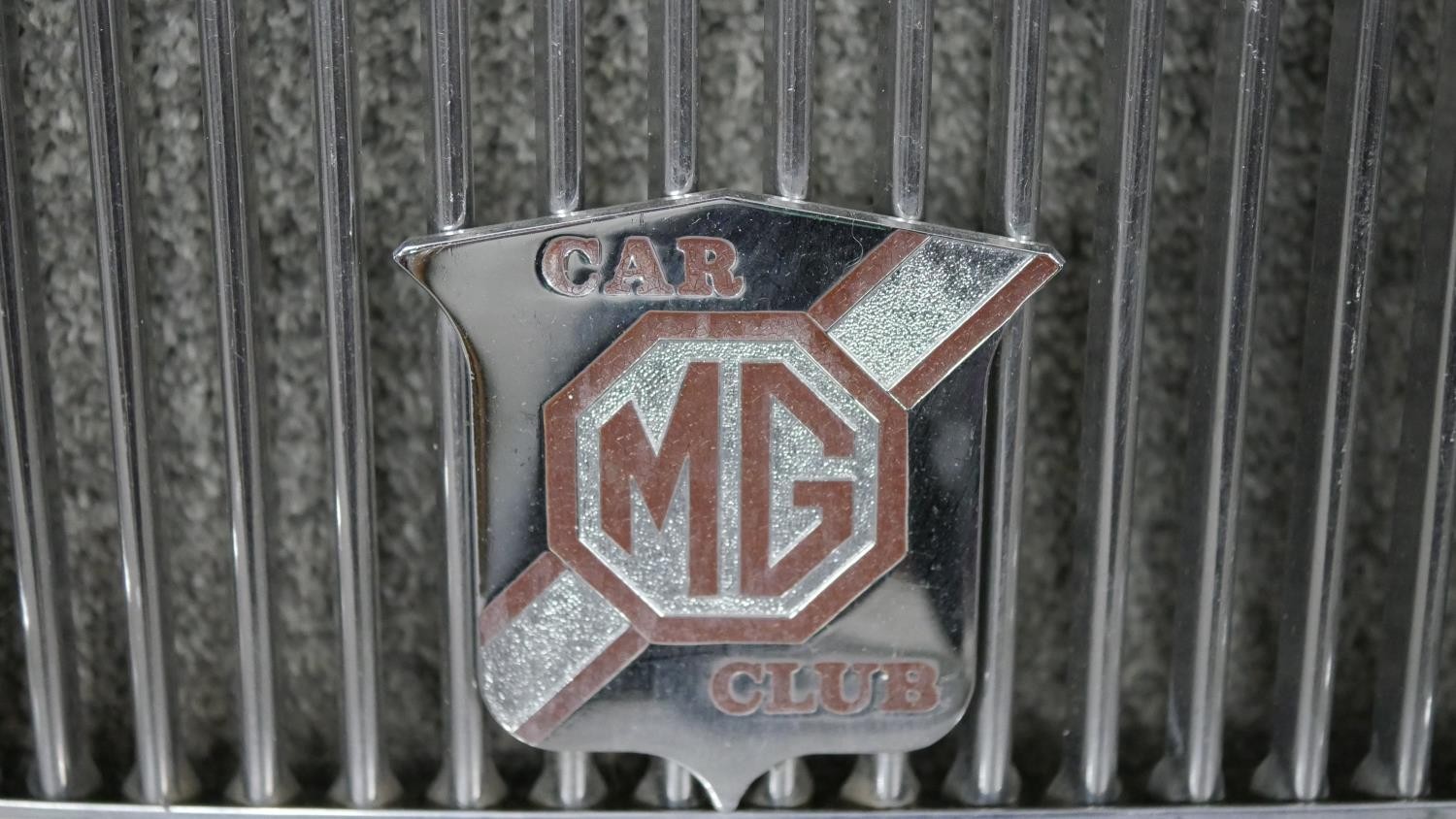 A vintage polished chrome MG car grille, with attached AA badge and MG Car Club badge. H.39 W.68cm - Image 4 of 5