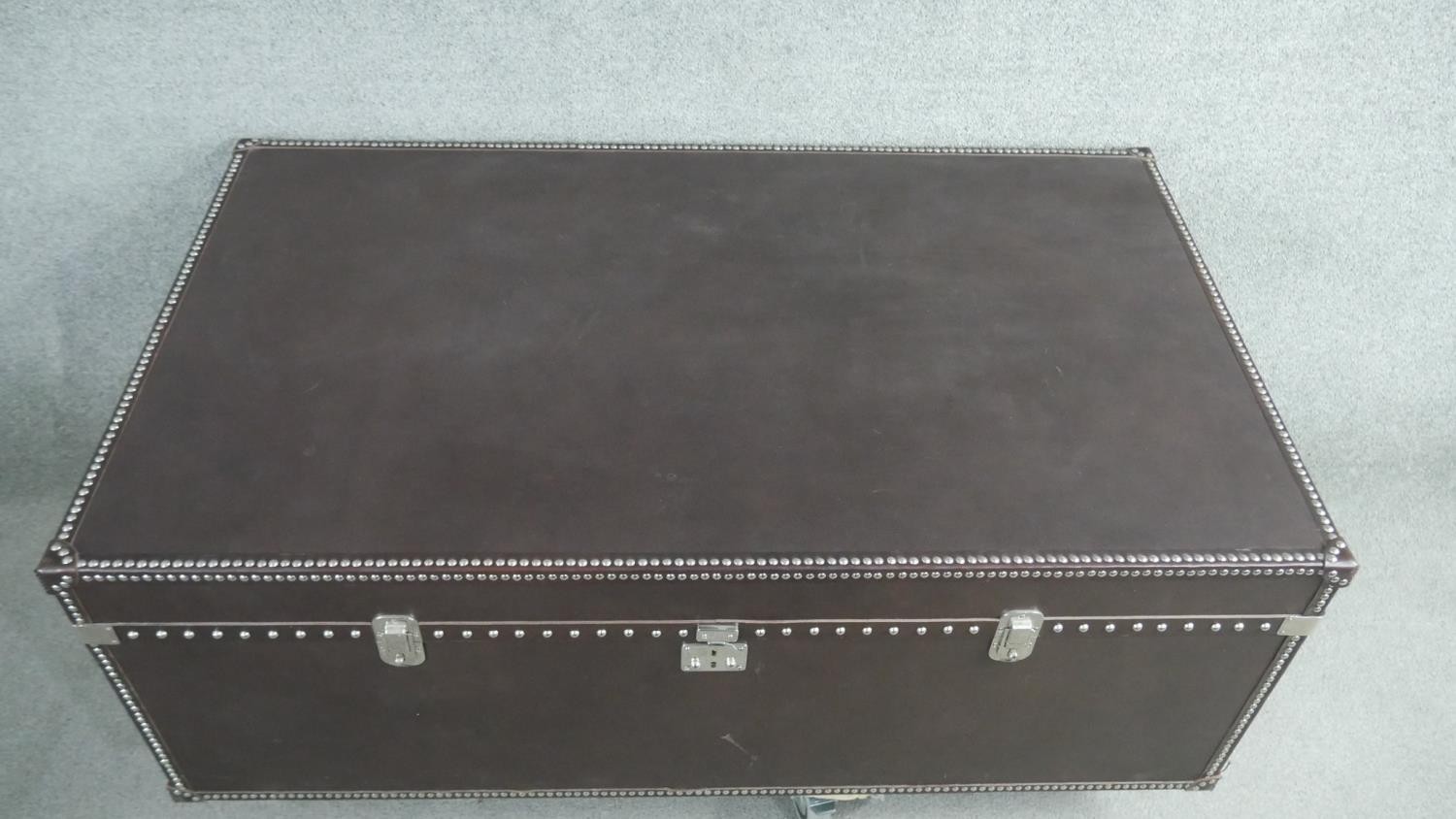 A Dentro Vittoria Steamer Trunk, upholstered in studded chocolate brown leather and having two - Image 2 of 10