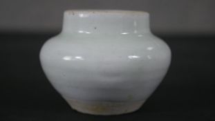 A Chinese celadon glaze ceramic vase, unglazed foot. H.7 W.8cm