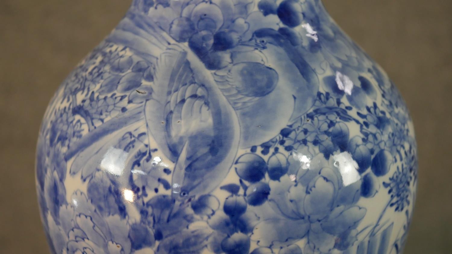 A large Japanese early 20th century blue and white hand painted porcelain vase with fluted edge. - Image 6 of 12