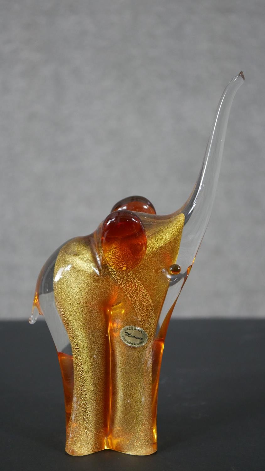 A Murano glass gold fleck glass elephant, with maker's label and signed to base along with a black - Image 2 of 8