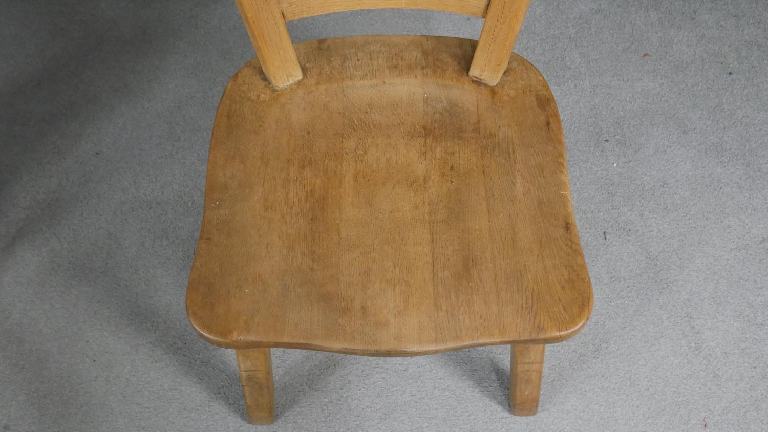 A set of six oak dining chairs, the shaped plank back, over a solid seat, on splayed square - Image 4 of 6