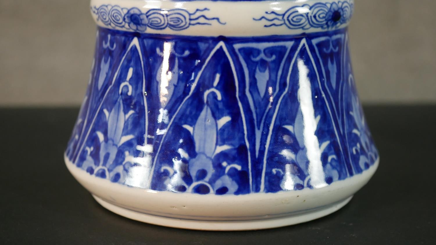 A large Japanese early 20th century blue and white hand painted porcelain vase with fluted edge. - Image 7 of 12