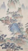 A framed and glazed Chinese ink on paper of a mountain landscape with artists seal. H.49 W.33cm