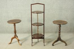 A 20th century mahogany folding three tier cake stand, together with a mahogany wine table on tripod