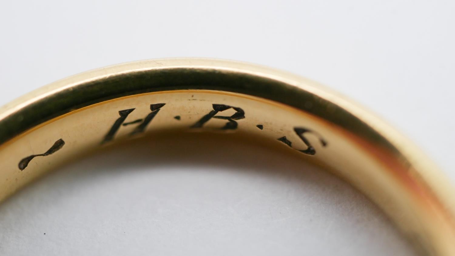 A size Q 18 carat yellow gold court shaped wedding band, engraved to the interior 'REF. HBS, 25.10. - Image 5 of 6