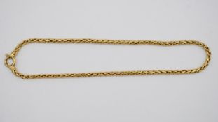 An Egyptian 18 carat yellow gold thick fancy rope chain with C-sprung clasp. Egyptian hallmarks