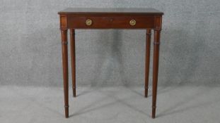 A George III style mahogany side table, the rectangular top with a reeded edge, over a single