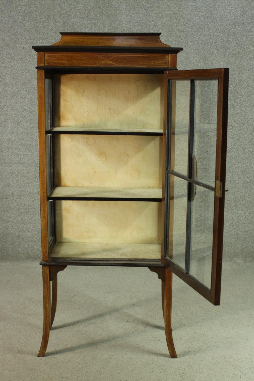 An Edwardian walnut display cabinet, with a gallery top, over a glazed door and sides, enclosing - Image 3 of 7