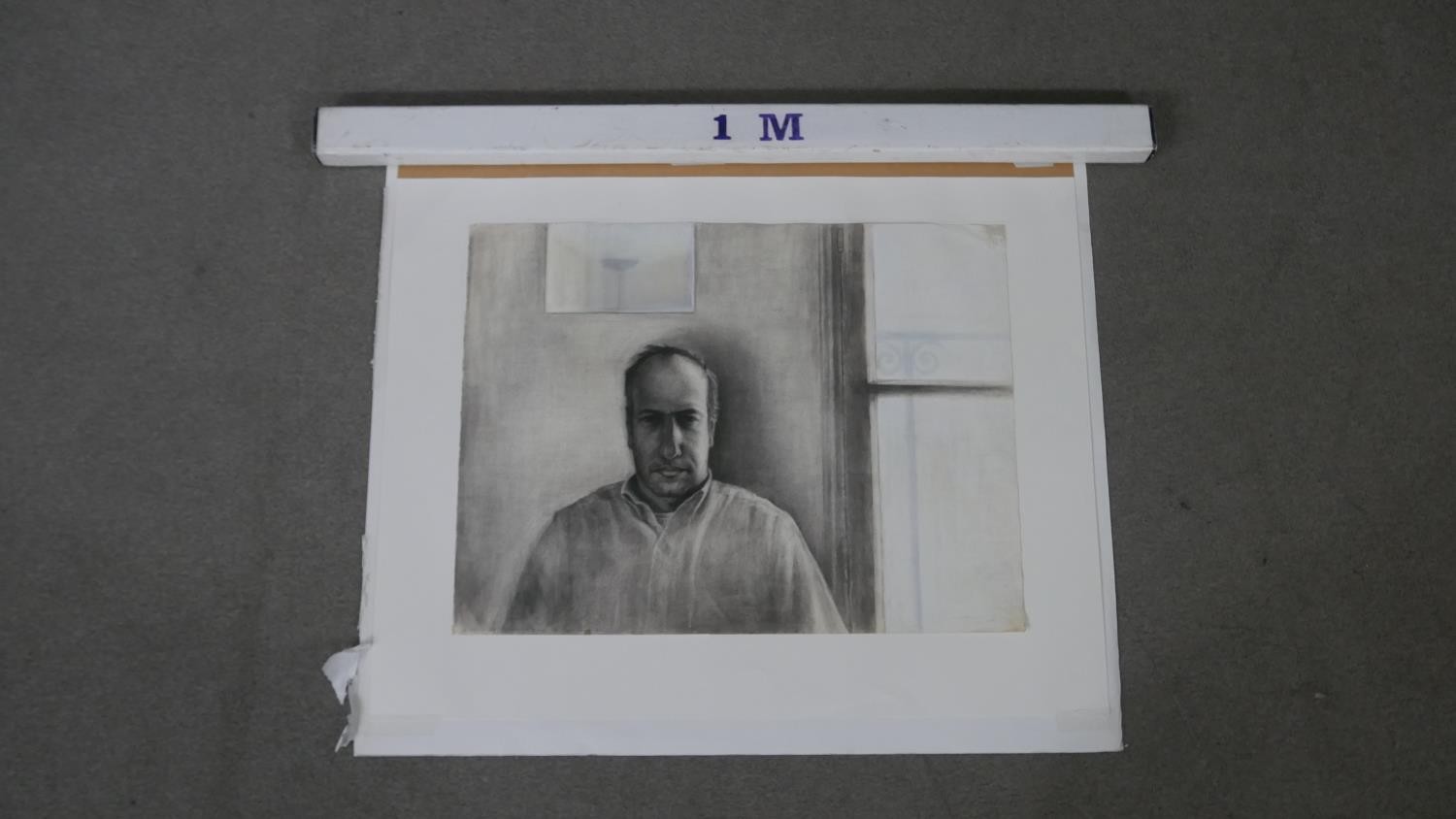 An unframed charcoal portrait of a man by a window, signed R. Levy. H.71 W.86cm (inc. mount) - Image 2 of 7