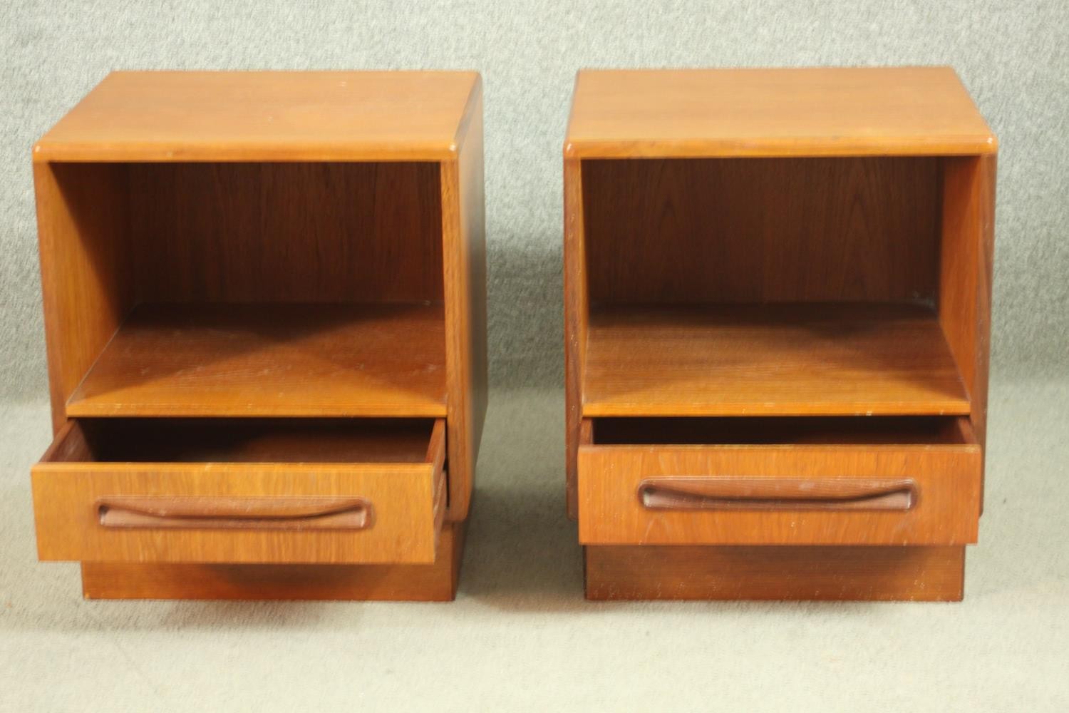 A pair of G-Plan teak bedside cabinets, with a recess over a single drawer, on a plinth base. H.53 - Image 5 of 13