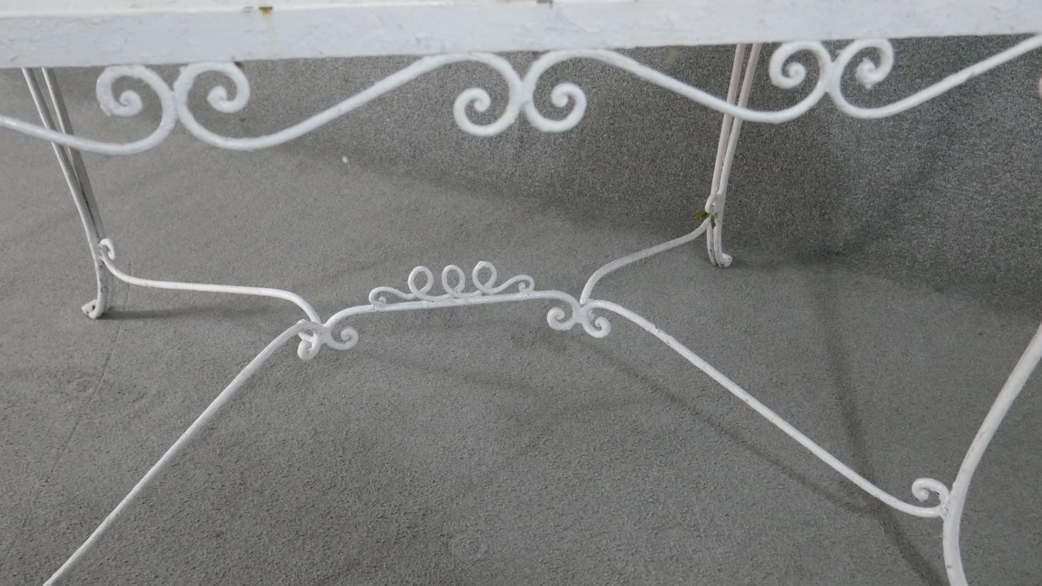 A white painted wrought iron garden table, of rectangular form with scrolling detail, the - Image 5 of 5