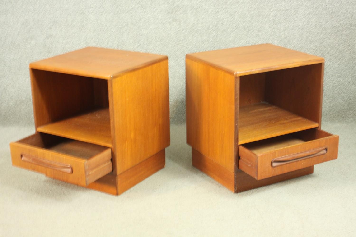 A pair of G-Plan teak bedside cabinets, with a recess over a single drawer, on a plinth base. H.53 - Image 10 of 13