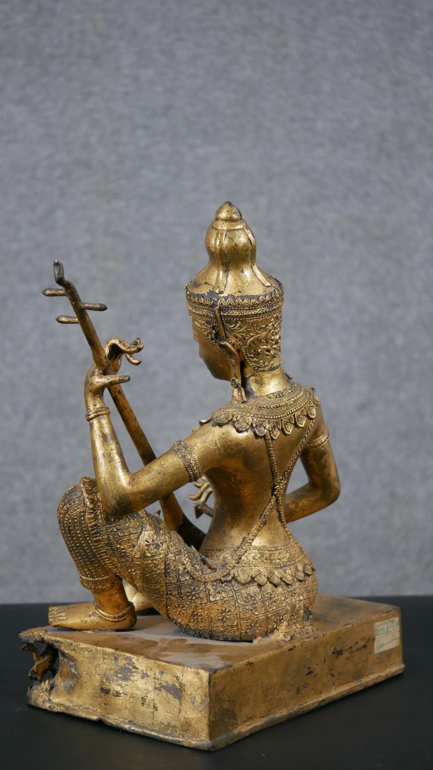 A 19th century gilded bronze Thai figure of Saraswati playing a vina. Animals and trees around the - Image 10 of 10