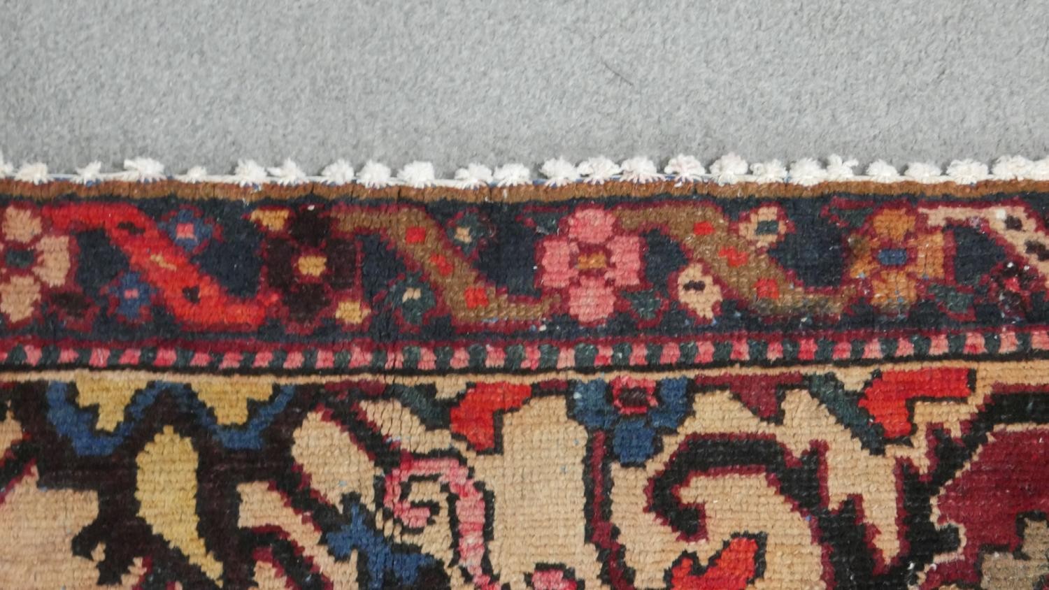 A vintage red ground hand made Persian Hamadan carpet. L.295 W.220cm - Image 6 of 7