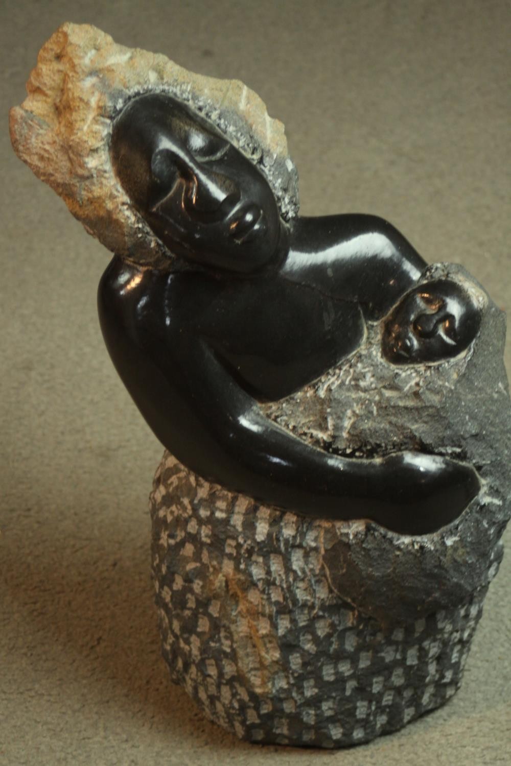 A Zimbabwean School carved soapstone sculpture of a mother and child. Unsigned. H.50cm. - Image 6 of 7