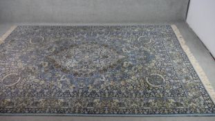 A blue ground Keshan motif carpet. L.290 W.200cm