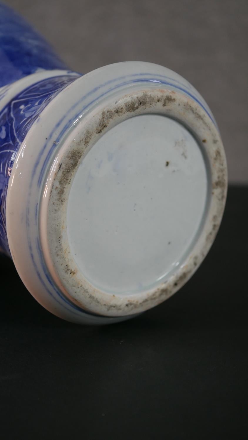 A large Japanese early 20th century blue and white hand painted porcelain vase with fluted edge. - Image 12 of 12
