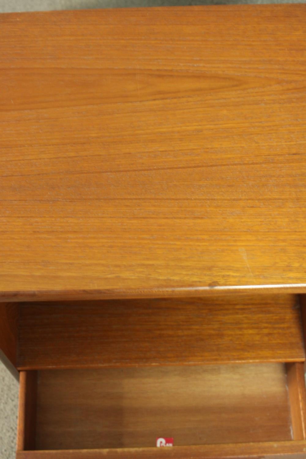 A pair of G-Plan teak bedside cabinets, with a recess over a single drawer, on a plinth base. H.53 - Image 11 of 13