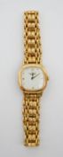 A vintage gold plated ladies Longines watch with square face and Longines articulated bracelet.