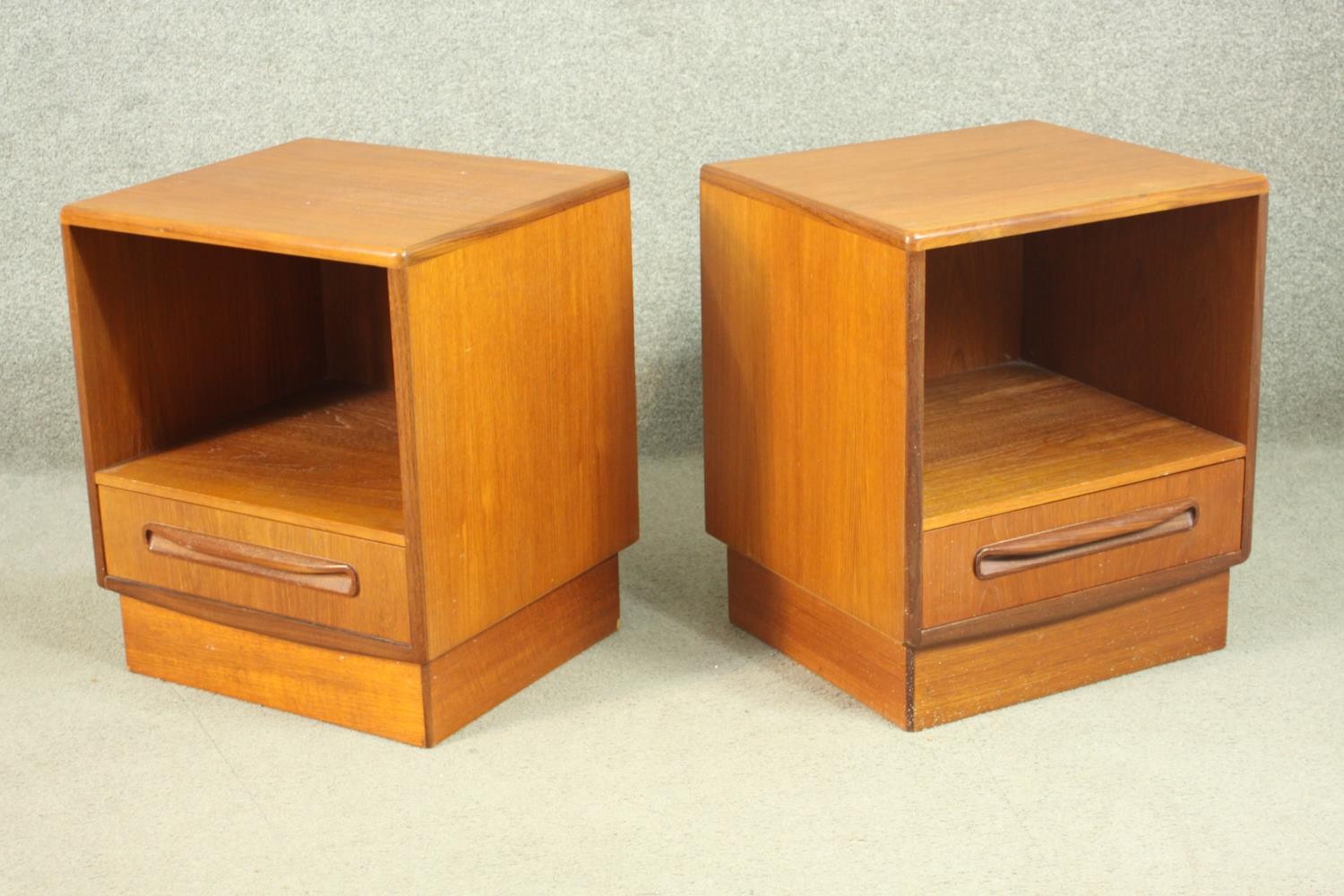A pair of G-Plan teak bedside cabinets, with a recess over a single drawer, on a plinth base. H.53 - Image 2 of 13