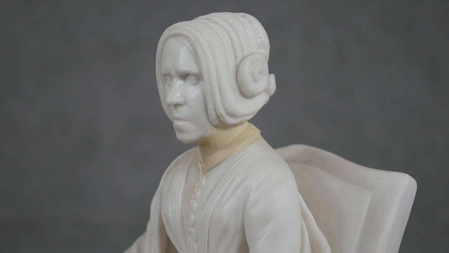 A Minton Parian ware model of an elderly lady seated in an armchair, a book open on her lap. - Image 4 of 8