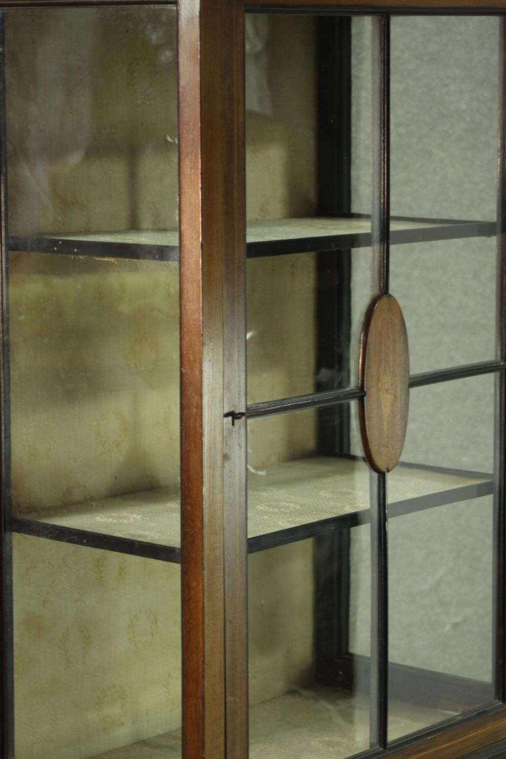 An Edwardian walnut display cabinet, with a gallery top, over a glazed door and sides, enclosing - Image 6 of 7