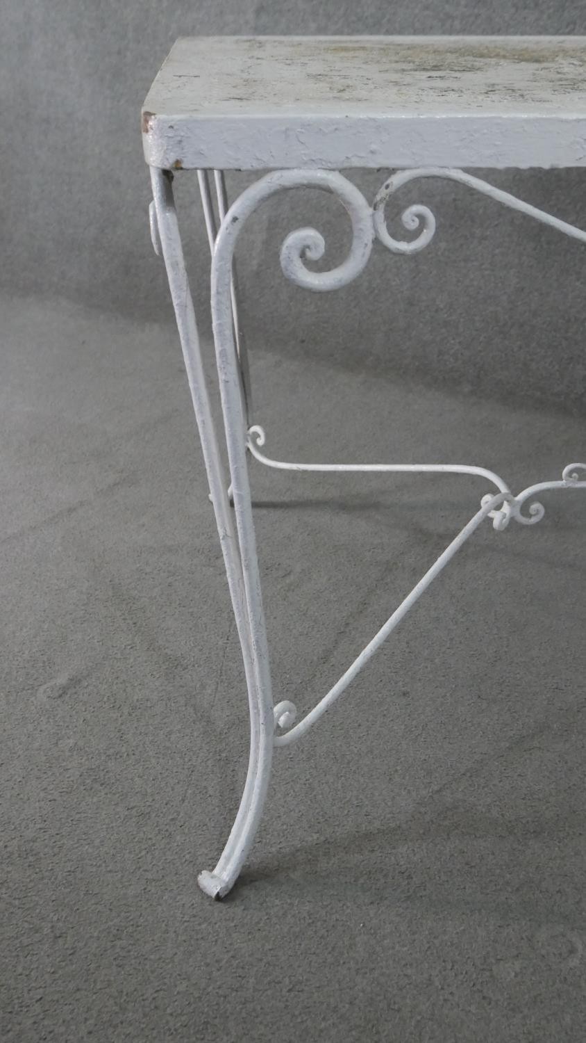 A white painted wrought iron garden table, of rectangular form with scrolling detail, the - Image 3 of 5