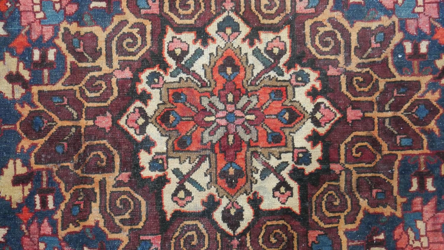 A vintage red ground hand made Persian Hamadan carpet. L.295 W.220cm - Image 3 of 7