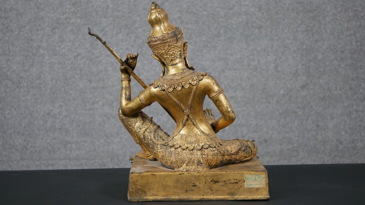 A 19th century gilded bronze Thai figure of Saraswati playing a vina. Animals and trees around the - Image 7 of 10