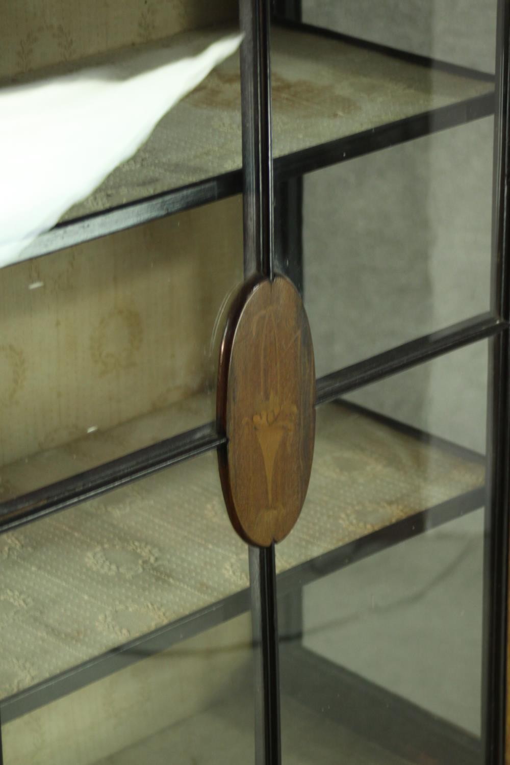 An Edwardian walnut display cabinet, with a gallery top, over a glazed door and sides, enclosing - Image 7 of 7