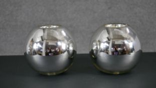 A pair of Art Deco silver mercury style blown glass globe vases. H.18 W.19cm (Largest)