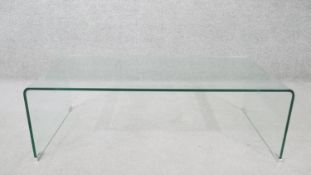 A contemporary glass coffee table. H.35 W.108 D.55cm