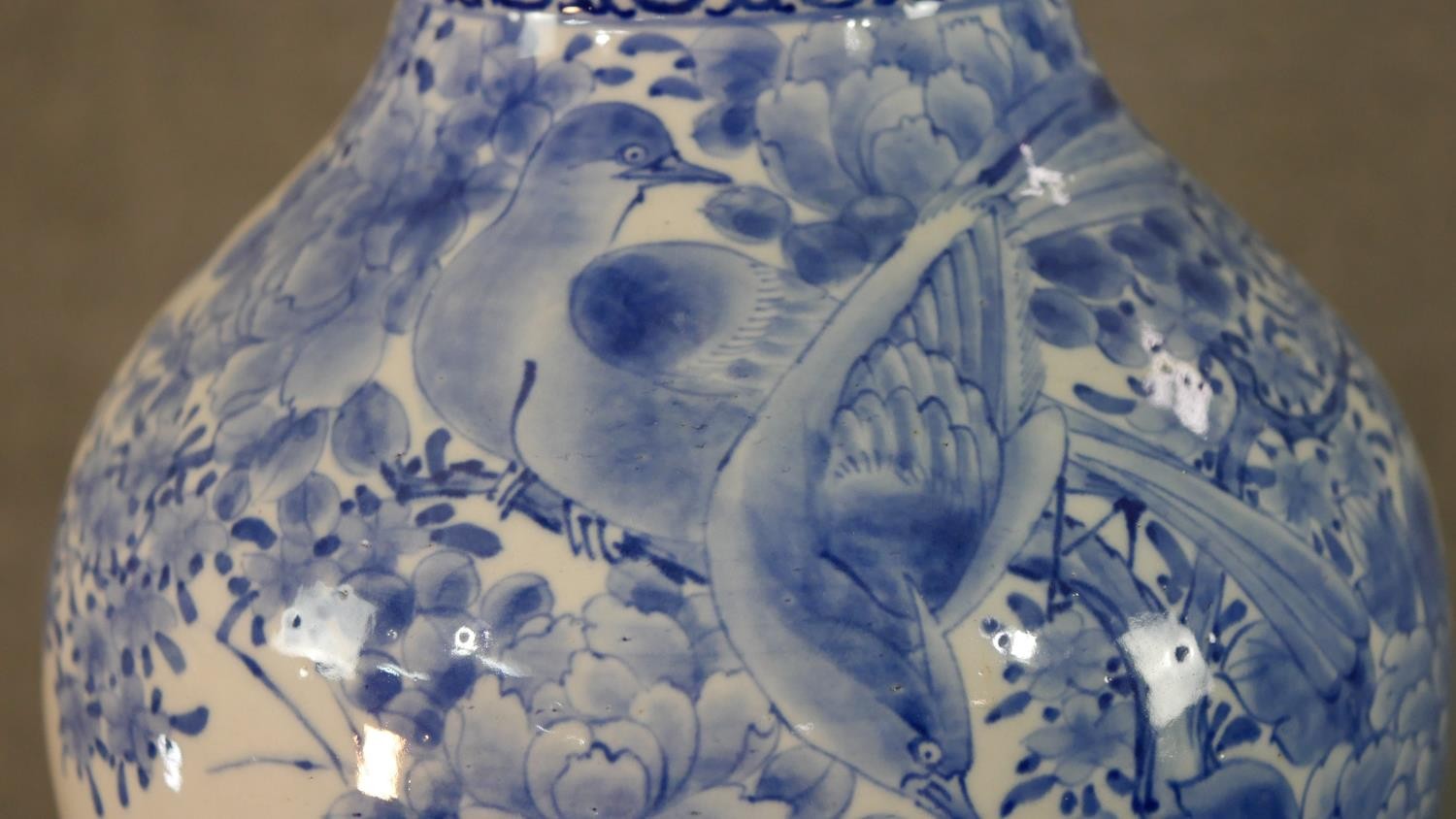 A large Japanese early 20th century blue and white hand painted porcelain vase with fluted edge. - Image 5 of 12