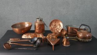 A miscellaneous collection of 19th century and later copperware, to include, moulds, ladles, bowls