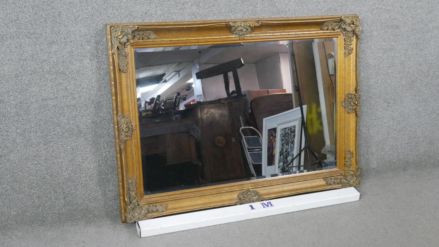 A rectangular gilt framed wall mirror, with a bevelled mirror plate, the frame with moulded - Image 2 of 5