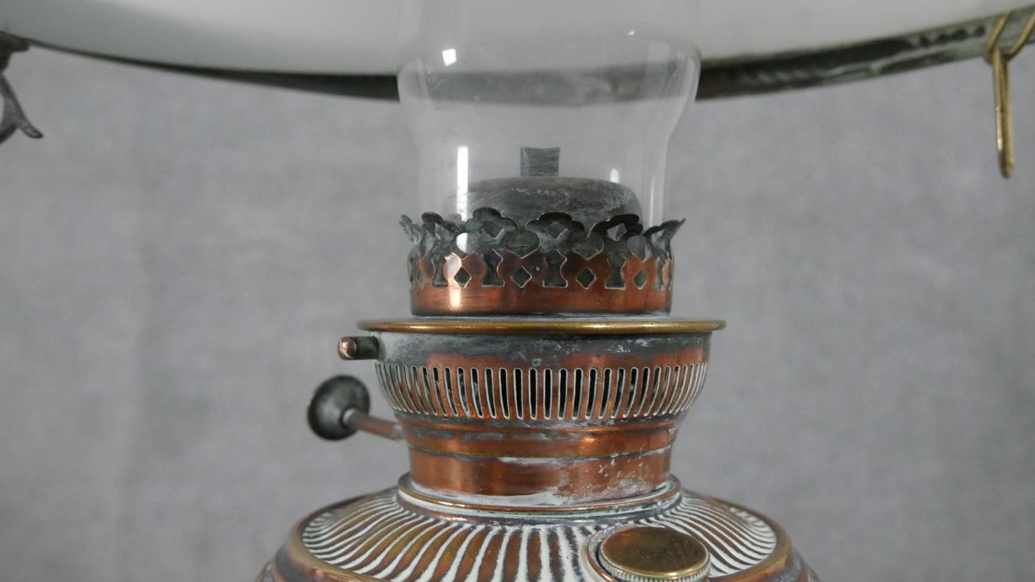 A 19th century hanging oil lamp with milk glass shade and a similar example with copper reservoir. - Image 5 of 17