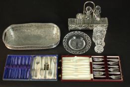A collection of silver plate and glass, including two boxed sets of cake forks, an engraved