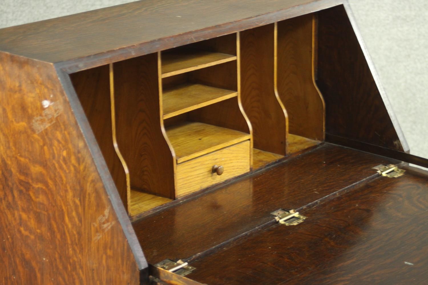 An early 20th century oak bureau, the fall front opening to reveal a fitted interior consisting of - Image 8 of 8