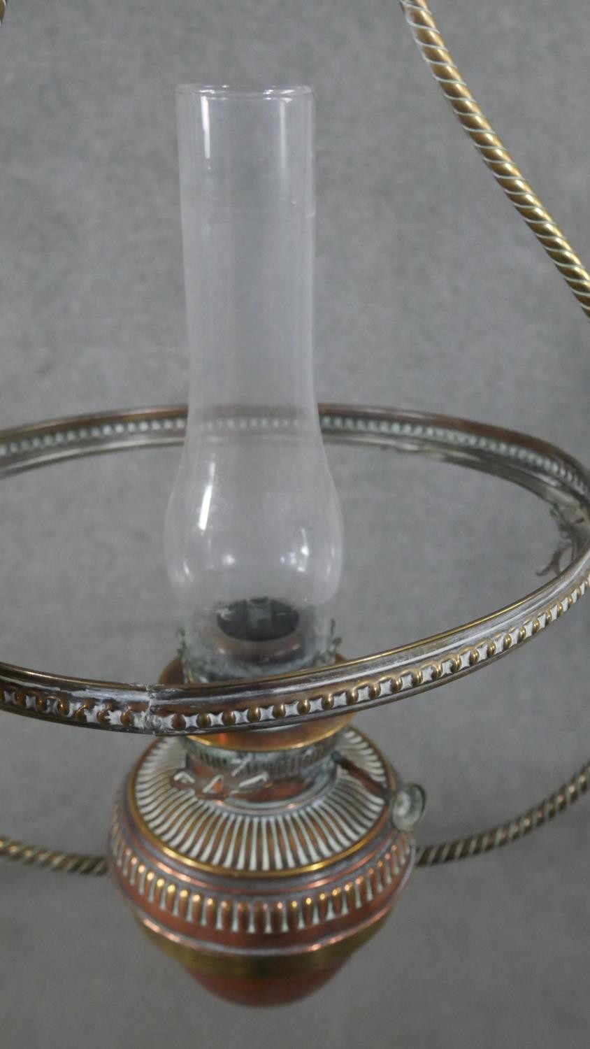 A 19th century hanging oil lamp with milk glass shade and a similar example with copper reservoir. - Image 8 of 17